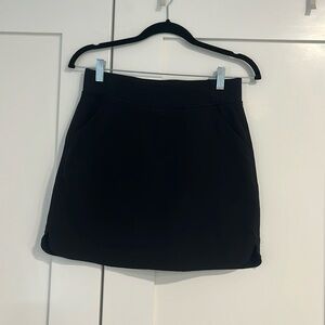 Black tennis skirt with pockets very flattering perfect condition